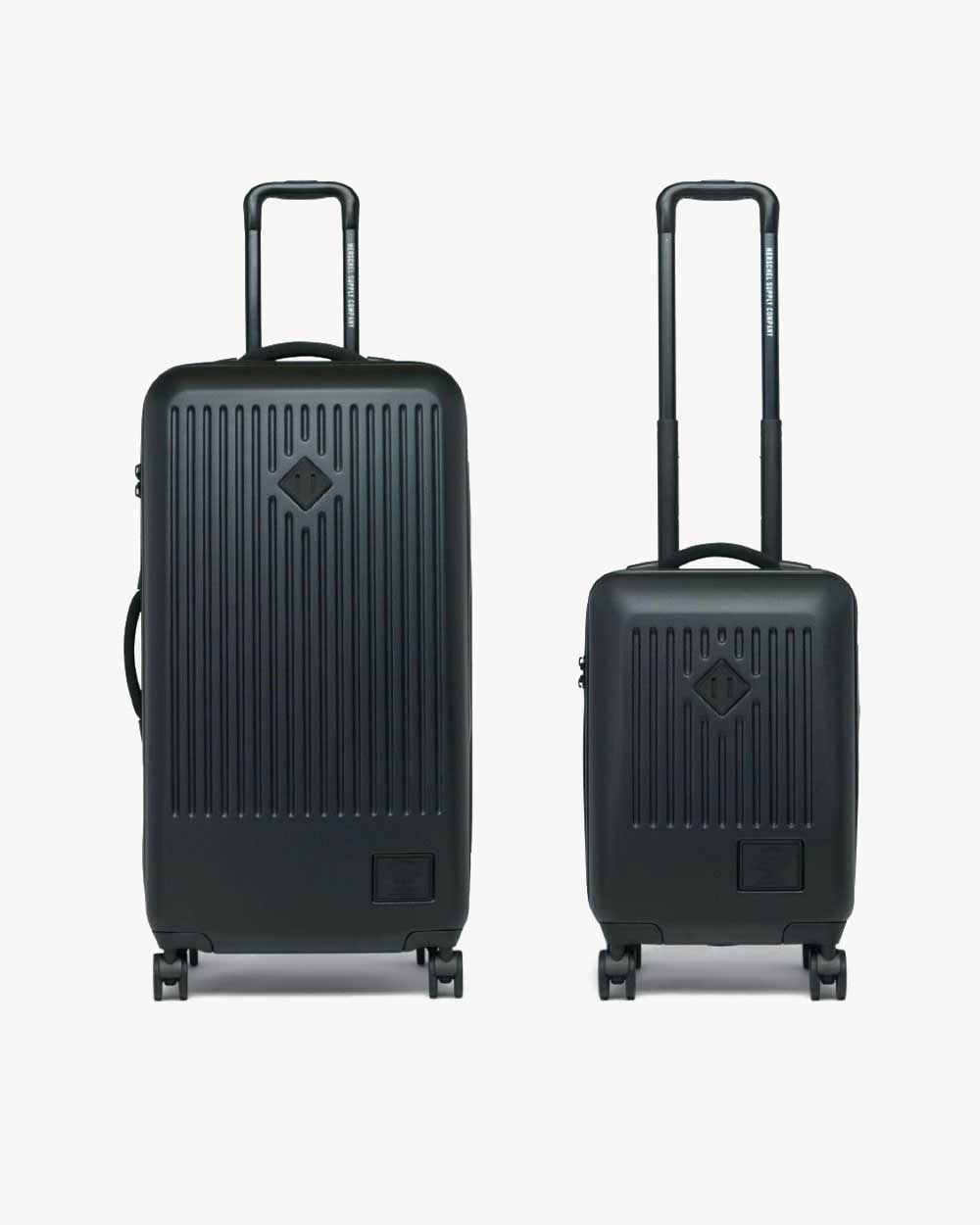 image of a black herschel trade large luggage and trade carry-on large luggage
